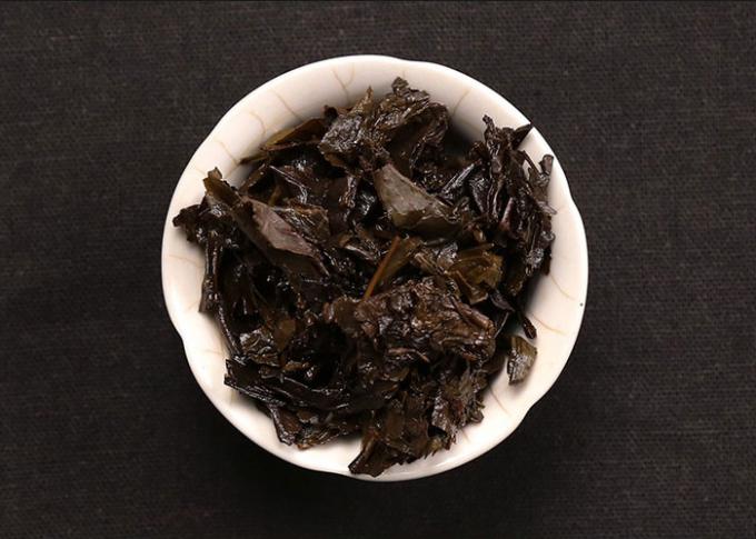 Ζυμωνομμένος επεξεργαμένος το κινεζικό σκοτεινό τσάι με το ομαλό και λεπτό γούστο