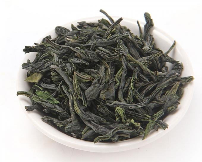 Το Anhui Liu ένα οργανικό πράσινο τσάι Gua Pian ανακατώνει - τηγανισμένος με ένα παρατεταμένο άρωμα φρούτων